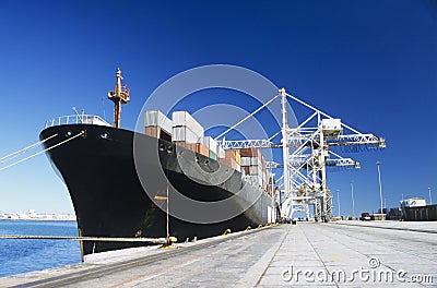 Container ship in docks Stock Photo