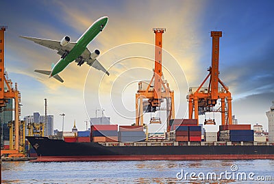 Container ship loading on port and cargo plane flying above for water and air transportation industry Stock Photo