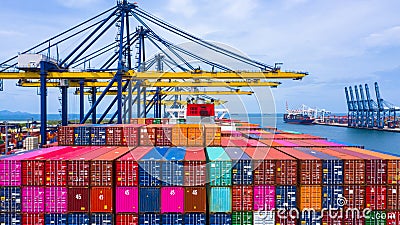 Container ship loading and unloading in deep sea port, Aerial top view of business logistic import and export freight Editorial Stock Photo