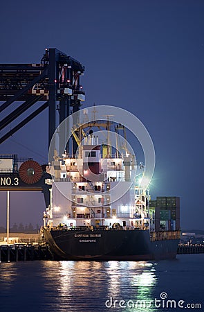 Container ship loads cargo at Port Botany, Sydney Editorial Stock Photo