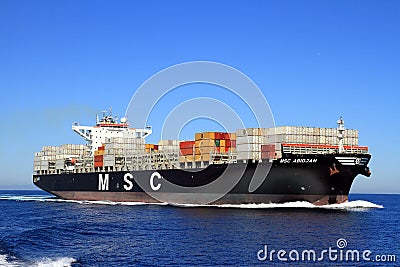 Big container ship MSC ABIDJAN sailing in open waters. Editorial Stock Photo