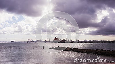 Container ship port background storm clouds Sydney Stock Photo