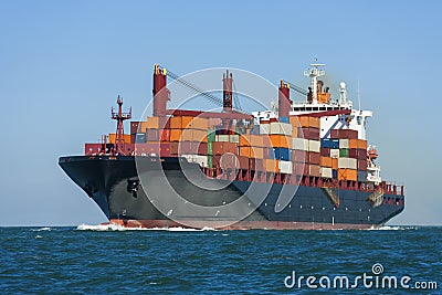 Container Ship at Sea Stock Photo