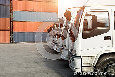 Container truck in depot at port. Logistics import export background and transport industry concept. Stock Photo