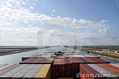 Cargo container ship transiting Suez Canal. Editorial Stock Photo