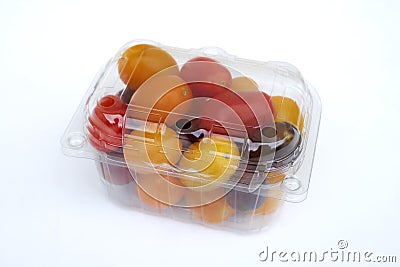 Containers plastic transparency with, Different sorts of tomatoes isolated on white background. Stock Photo