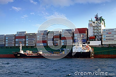 Containership AS MAGNOLIA abroaded to a tanker vessel. Editorial Stock Photo