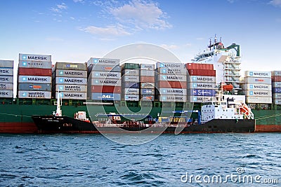 Containership AS MAGNOLIA abroaded to a tanker vessel. Editorial Stock Photo