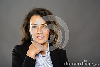 Contemplative smiling businesswoman Stock Photo