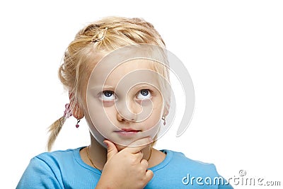 Contemplative young girl (child) looks up. Stock Photo