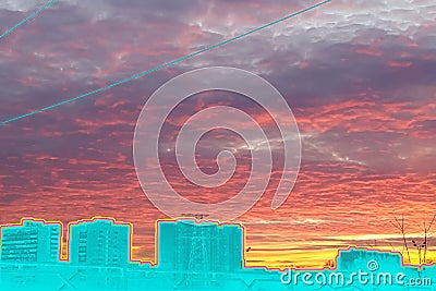 Contemporary art collage. City view against the sky with thick clouds at sunset in bright orange and purple tones. Concept Stock Photo