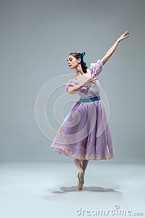 Contemporary ballroom dancer on grey studio background Stock Photo