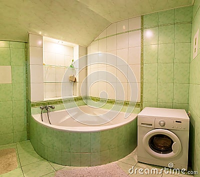 Contemporary bathroom interior, big bath Stock Photo