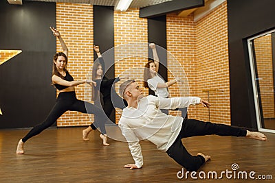 Contemporary dance performers posing in studio Stock Photo