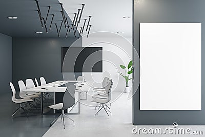 Contemporary designer meeting room interior with furniture, empty mock up presentation frame and daylight. Stock Photo