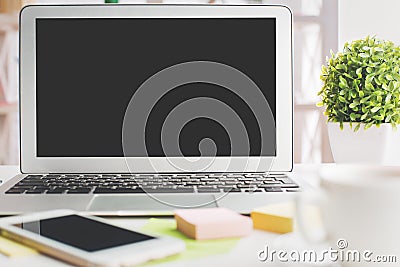 Contemporary desktop with laptop screen Stock Photo