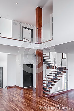 Contemporary Mahogany stairs new house with post and gallery Stock Photo