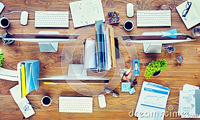 Contemporary Office Desk with Computers and Office Tools Stock Photo