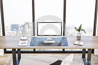 Contemporary office interior with book shelves, furniture, panoramic city view and empty white mock up computer screen. Creative Editorial Stock Photo