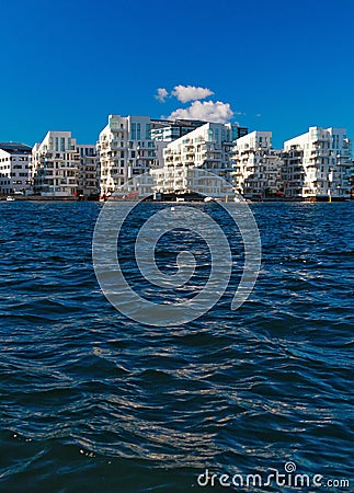 Contemporary white buildings on the blue water Stock Photo