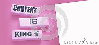 Content is king words on wooden blocks on dark grey background. Copywriting storytelling concept Stock Photo
