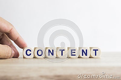 Content - word from wooden blocks with letters on a table Stock Photo