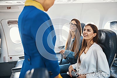 Contented friendly passengers demonstrating how they follow the rules Stock Photo