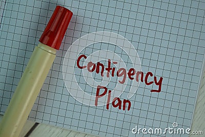 Contigency Plan write on a book isolated on Wooden Table Stock Photo