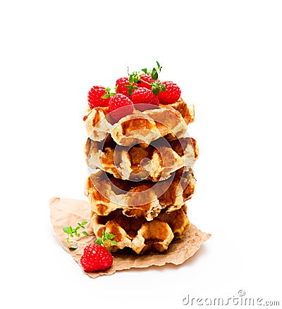 Continental classics belgian butter waffles with raspberries is Stock Photo