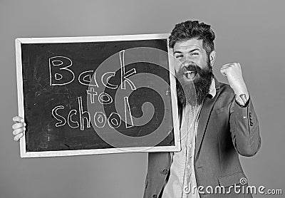 Continue your education with us. New semester in school. Teacher invites to continue studying. Teacher bearded man Stock Photo