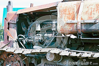 Continuous caterpillar tracks of the bulldozer. Close up. detail of a rusty tractor tracks. Stock Photo