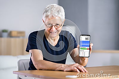 Continuous Glucose Monitor Blood Sugar Test Smart Phone Stock Photo