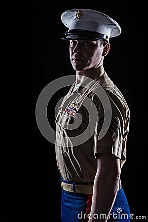 Contour shot of US marine in blue dress uniform Stock Photo