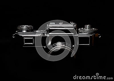 Contour of a vintage camera in the dark Stock Photo