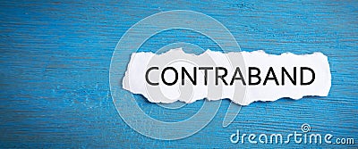 Contraband word on torn paper. Business Stock Photo