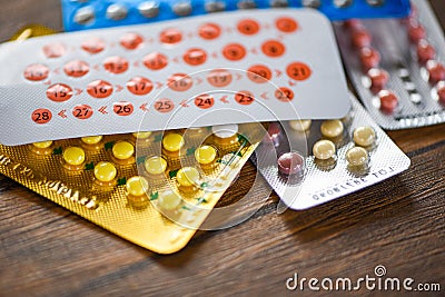 Contraceptive pill Prevent Pregnancy Contraception concept Birth Control on wooden background Stock Photo
