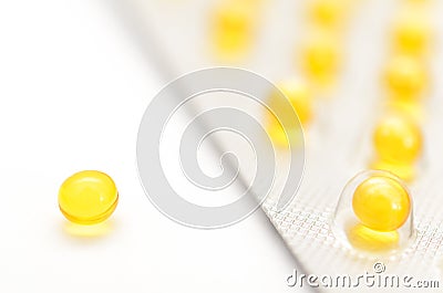 Contraceptive tablets in packages and without on a light background. Stock Photo