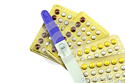 Contraceptive tablets And pregnancy test on white background Stock Photo