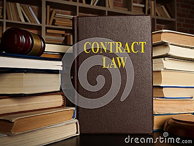 Contract law and pile of papers with gavel. Stock Photo