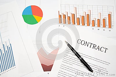 Contracts, charts, and graphs on the desk. Business desk concept Stock Photo