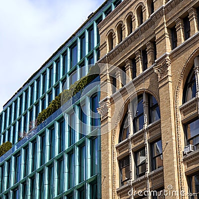 Contrast of old and modern buildings on Bond St in NOHO NYC Editorial Stock Photo