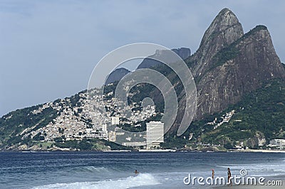 Contrast between richness and poverty: Ipanema beach and favela, Rio de Janeiro, Brazil. Editorial Stock Photo