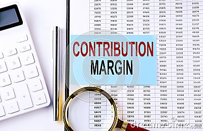 CONTRIBUTION MARGIN on sticker on chart background, business concept Stock Photo