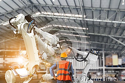 Control engineer Robotic arms industrial robots, factory automation machines Stock Photo