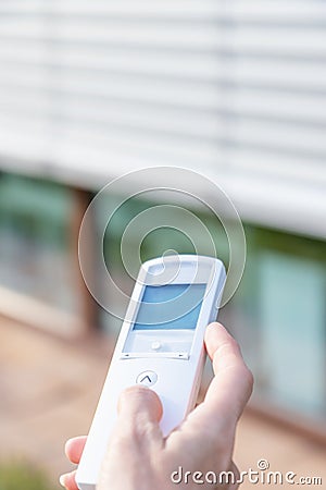 Control the external window blinds concept Stock Photo