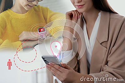 Control kid`s geolocation via smart watch. Mother and daughter with gadgets, creative design Stock Photo