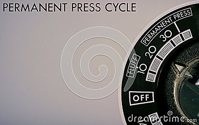 Control knob on a washing machine and dryer Stock Photo