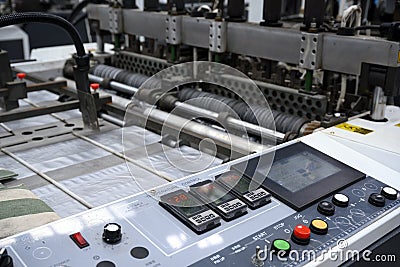 Control panel and high speed plastic bag cutting machine Stock Photo