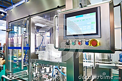 Control panel monitor on conveyor at food factory for packing Stock Photo