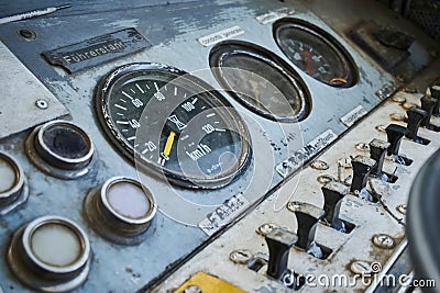 Control panel an old boat with a variety of gauges and dials Stock Photo